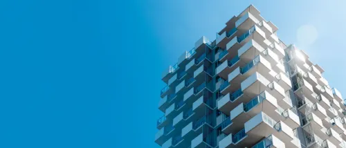 Residential building. bottom view. Modern apartment building on a sunny day. Facade of a modern apartment building.