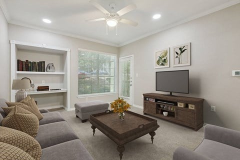 a living room with a couch and a tv