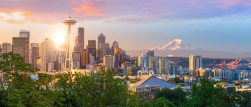 An aerial view of the skyline in Seattle, a city where you can find luxury apartments at lower rents.