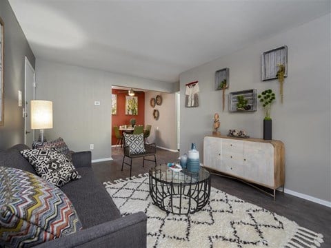 a living room with a couch and a table