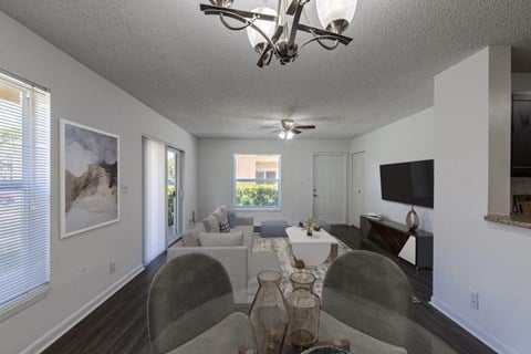 a living room with a couch and a table
